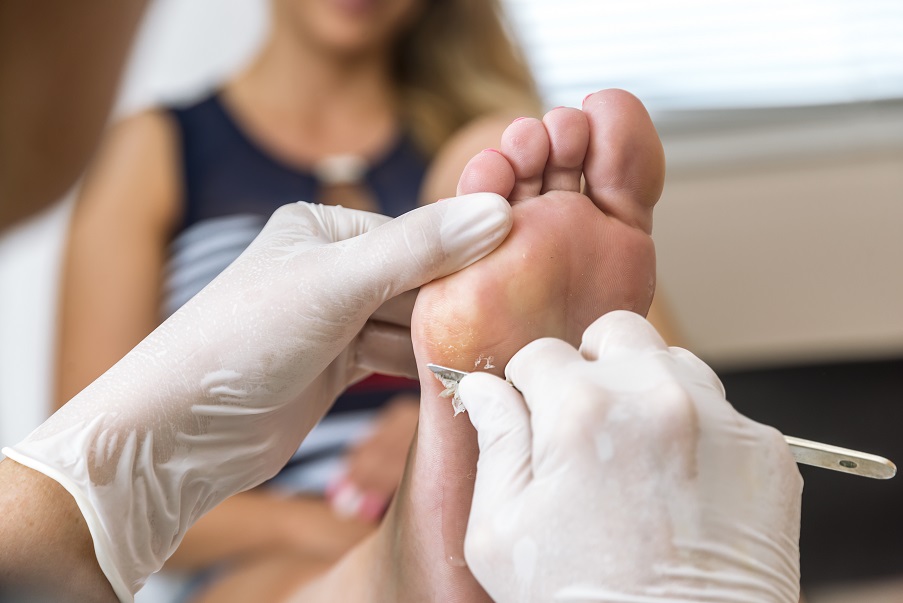 Consultation chez un dermatologue