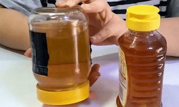 Pot de miel transparent pour vérification