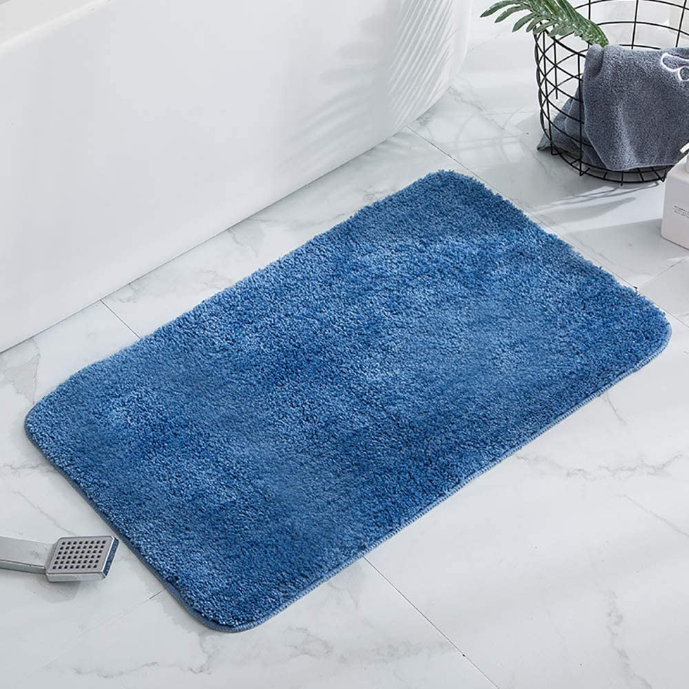 Matériel pour nettoyer manuellement un tapis de bain